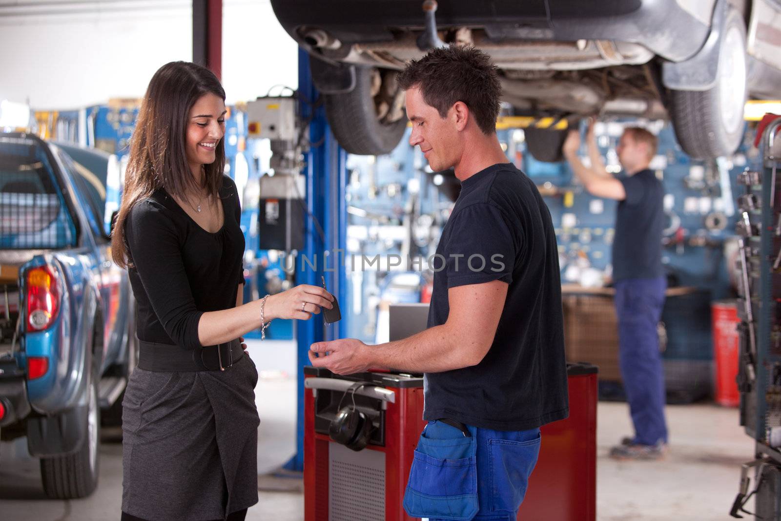 Customer Dropping Off Car at Mechanic by leaf