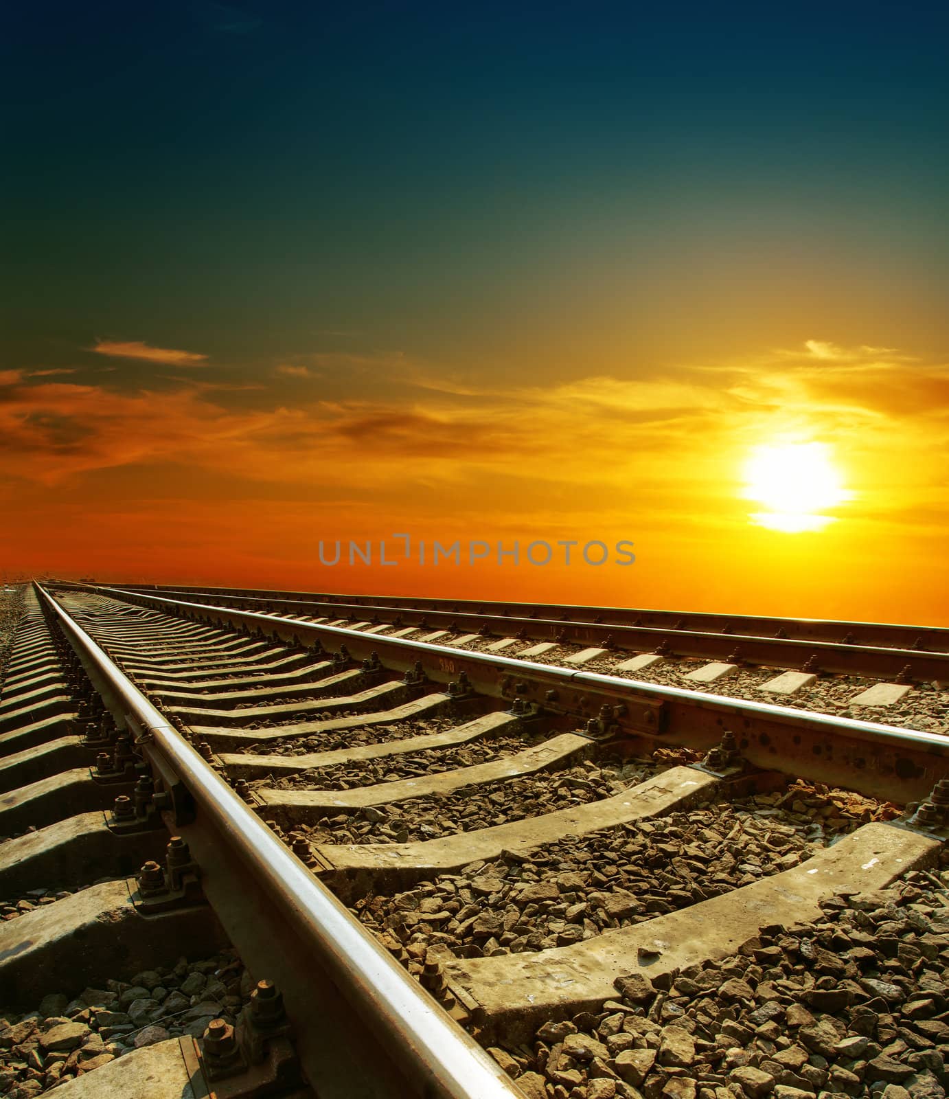 sunset over railroad