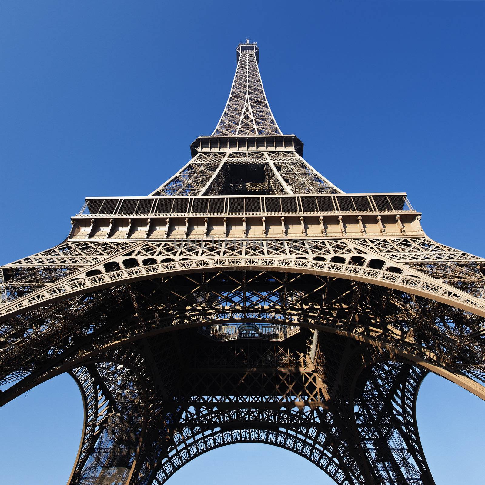 Part of famous Eiffel tower with blue sky in Paris