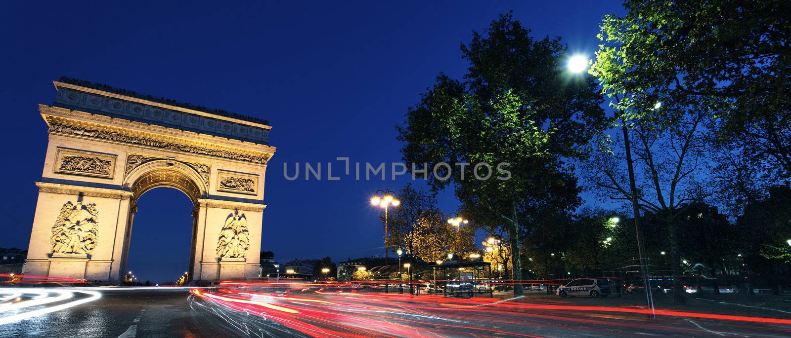 Panoramic view of Arc de Triomphe by night, Paris