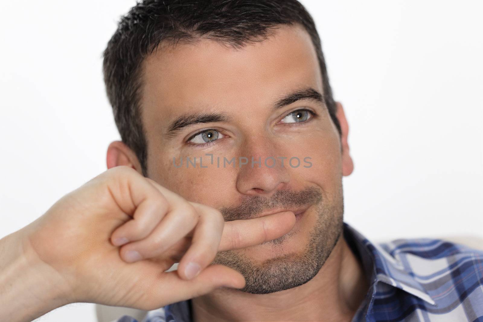 portrait of beautiful man relax on sofa at home