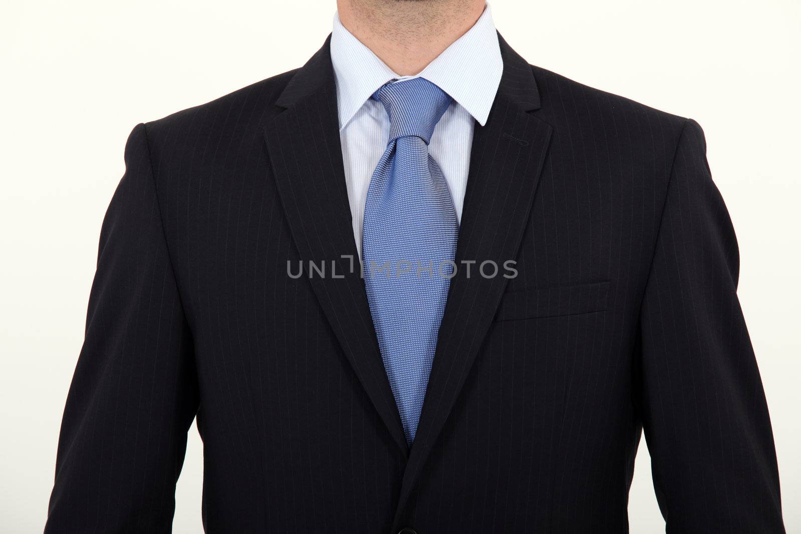 Close-up of man wearing suit by phovoir