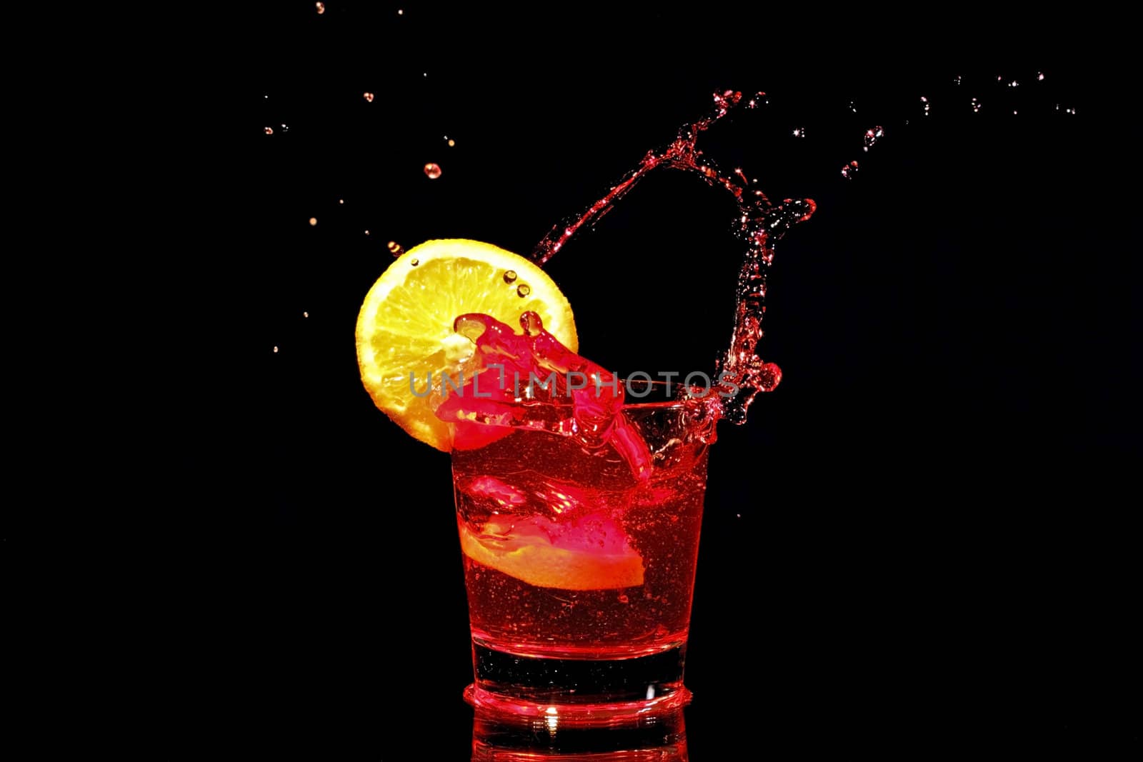 Red wine splash with a slice of orange
