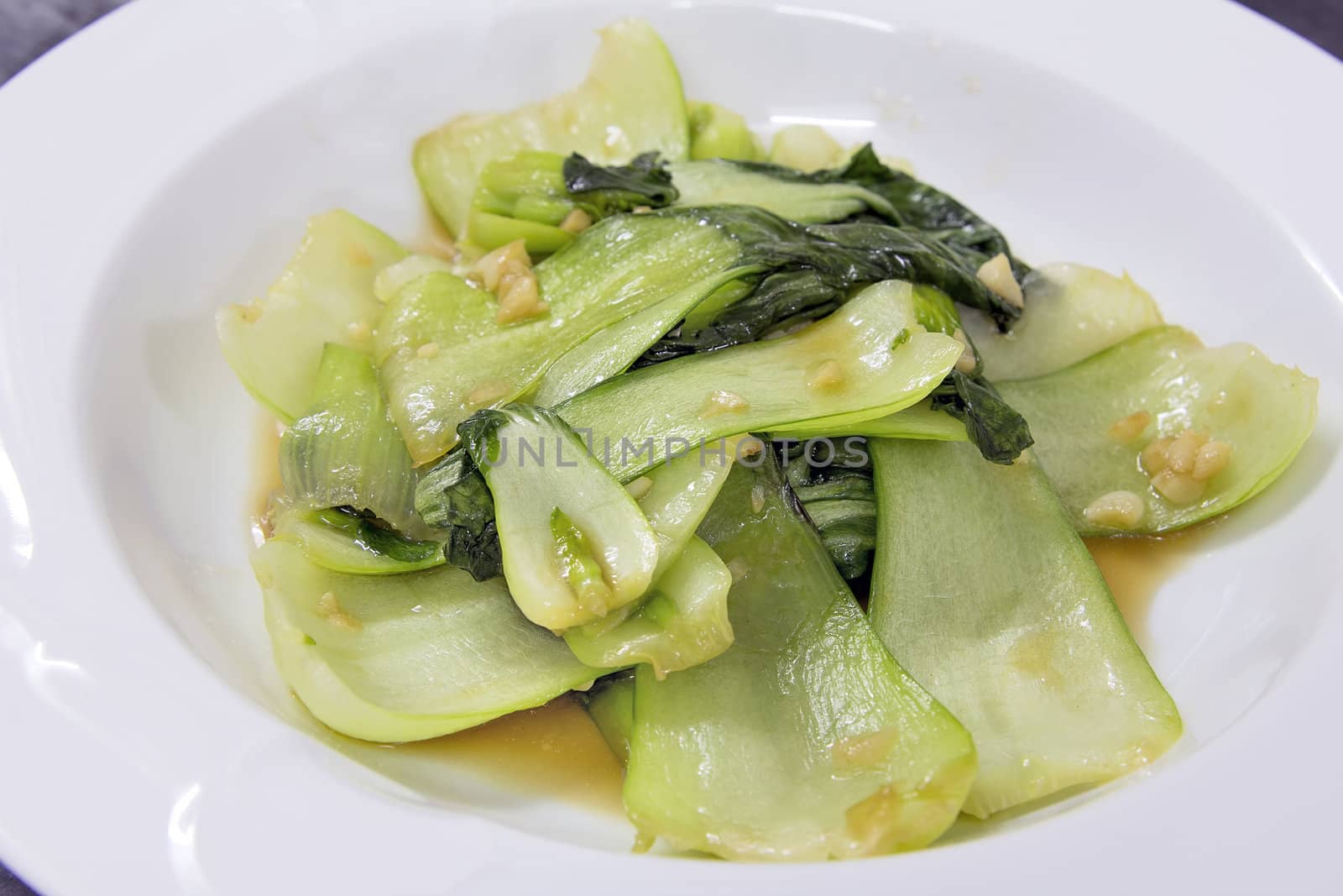 Chinese Bok Choy Green Vegetables Stir Fry with Garlic and Soy Sauce Dish