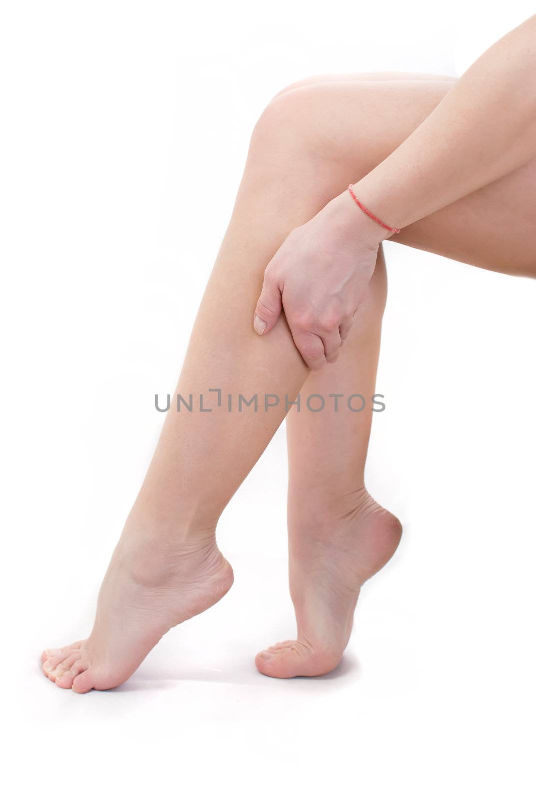beautiful female legs isolated on white background