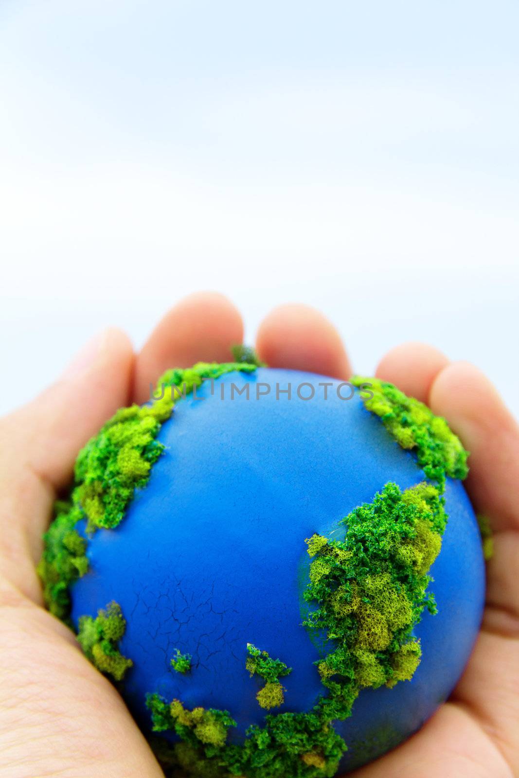 Hands and Earth. Concept Save green planet.