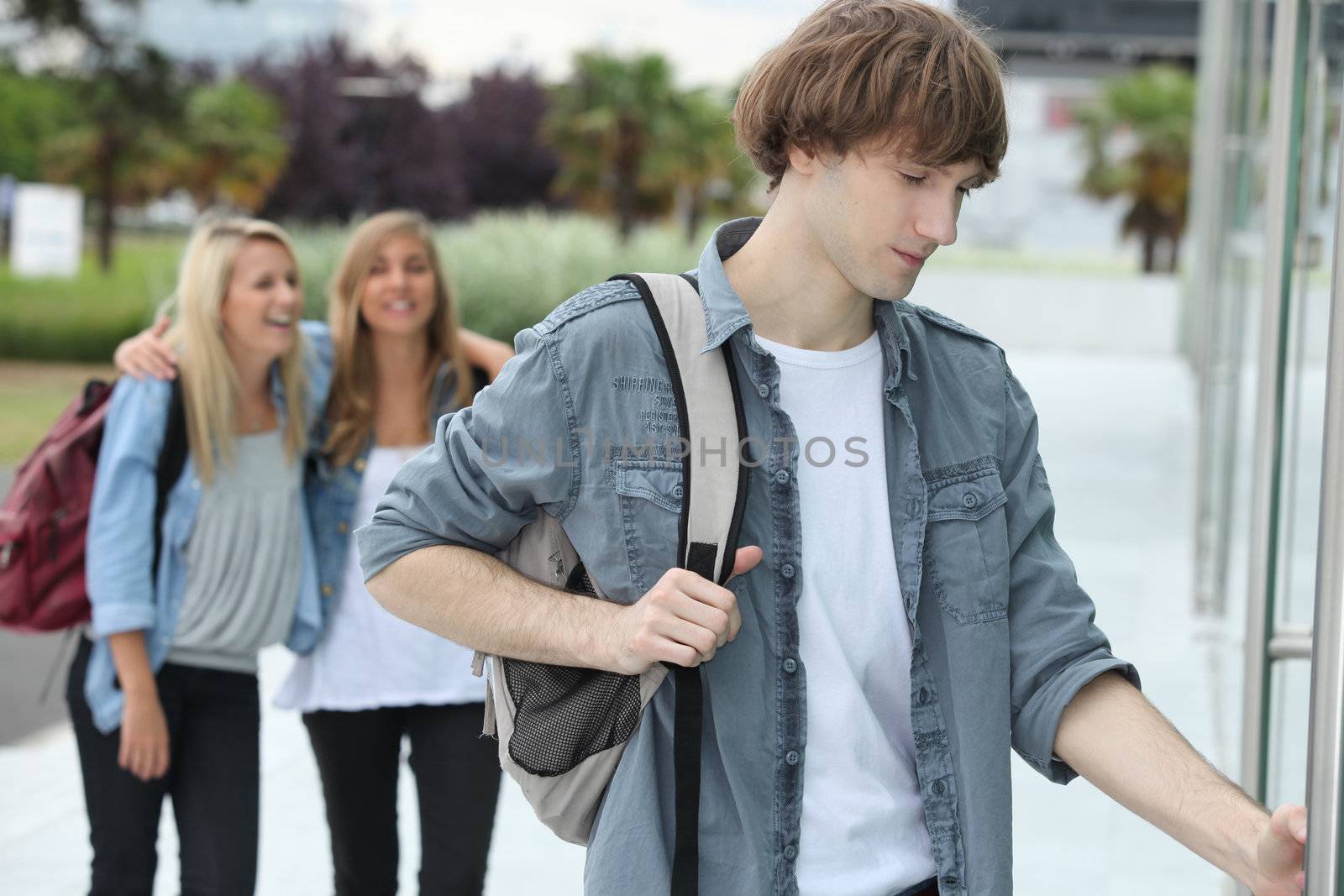 Teenagers arriving at college by phovoir