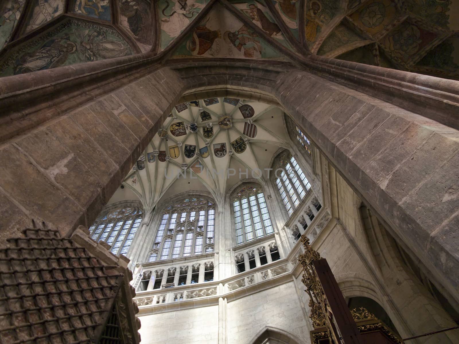 Saint Barbara's Church in Kutna Hora (Czech republic) is one of the most famous Gothic churches in central Europe and it is a UNESCO world heritage site. St Barbara is the patron saint of miners (among others), which was highly appropriate for a town whose wealth was based entirely upon its silver mines.Construction began in 1388, but because work on the church was interrupted several times, it was not completed until 1905. The first architect was probably Johann Parler, son of Peter Parler, but studies say that Peter Parler had participated at least as a co-author of the draft design. Work on the building was interrupted for more than 60 years during the Hussite Wars and when work resumed in 1482, Matej Rejsek and Benedikt Rejt, two architects from Prague, assumed responsibility.