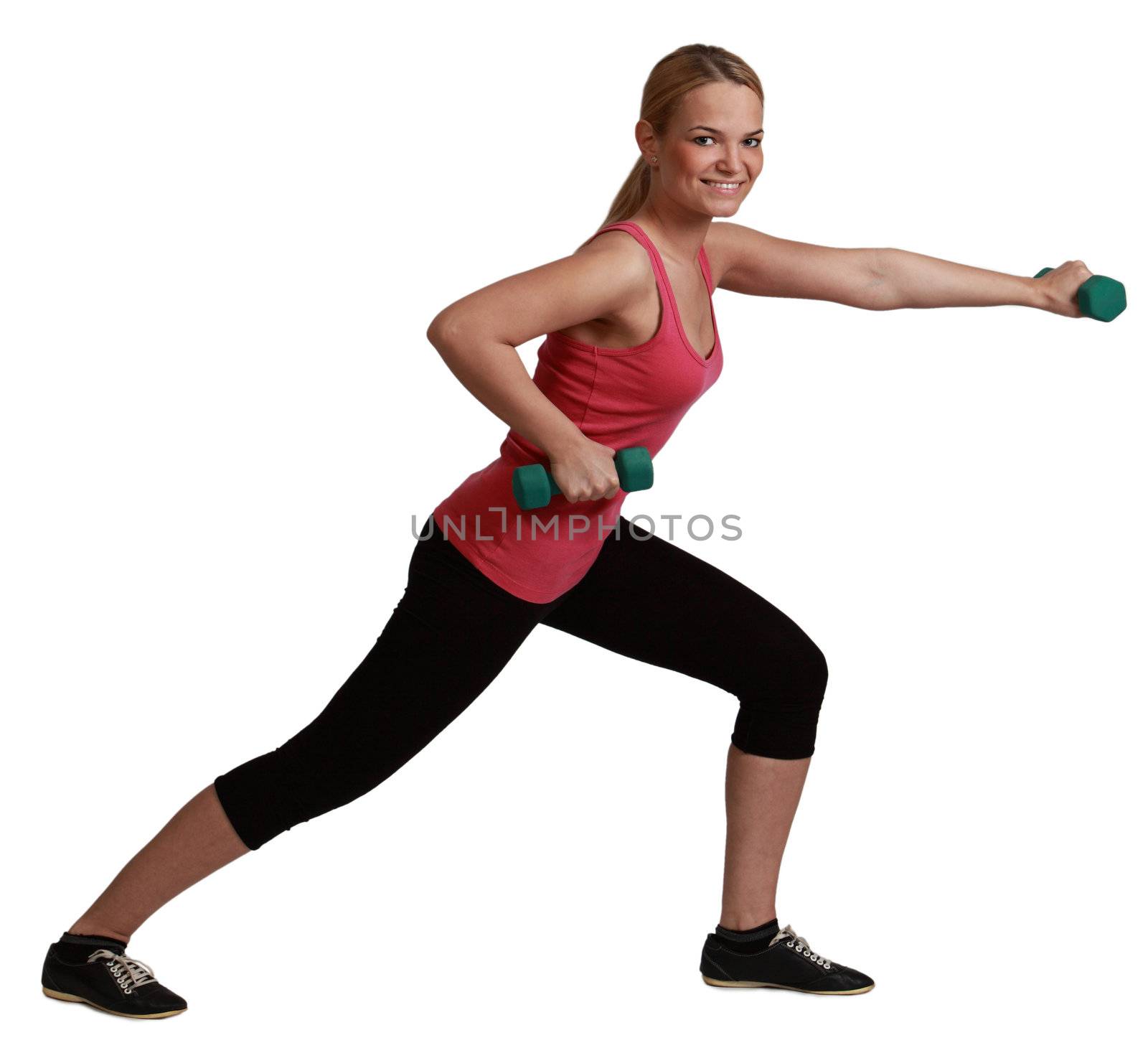 Young blonde woman doing exercise with dumbbells isolated against a white background.