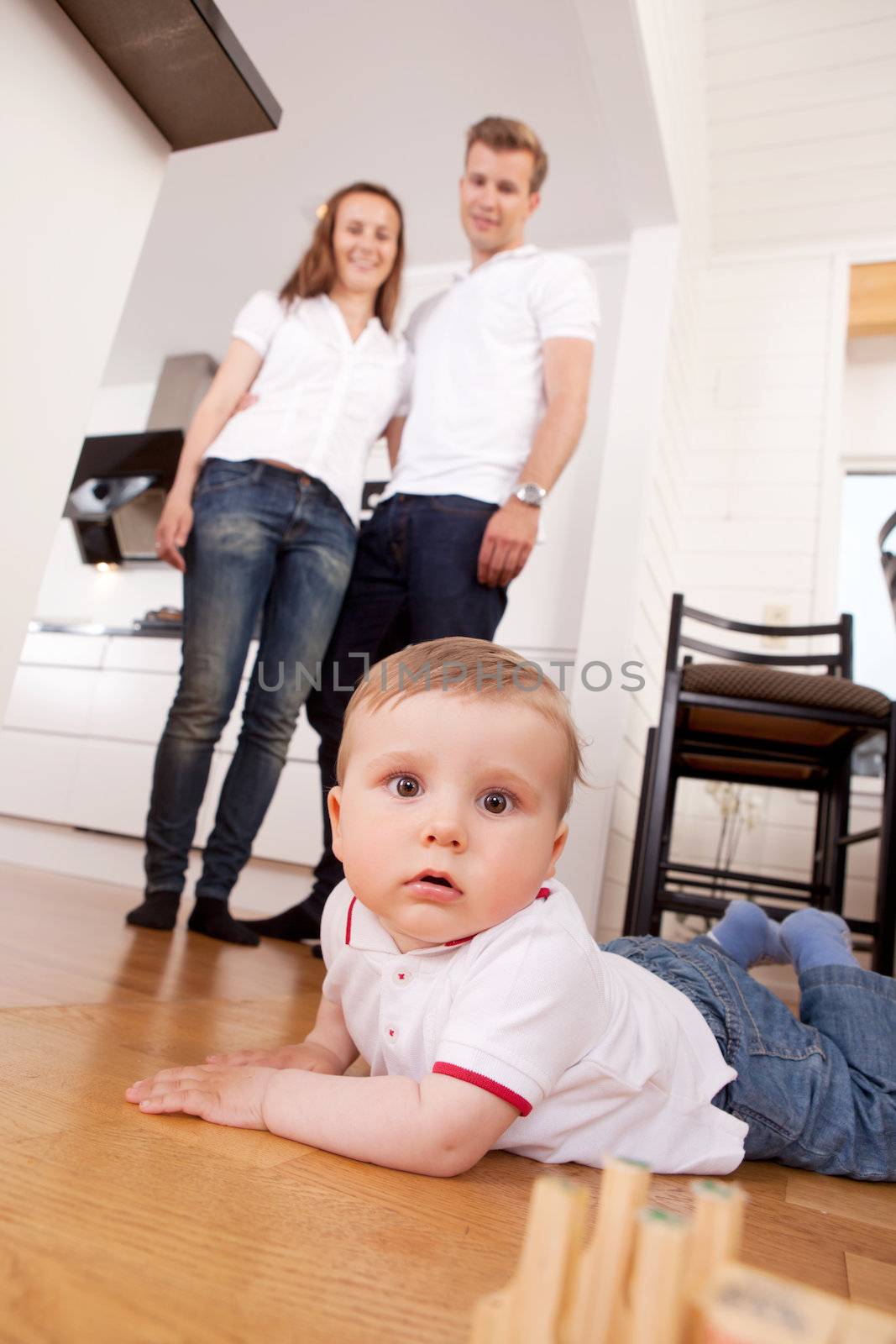 Child on Floor at Home by leaf