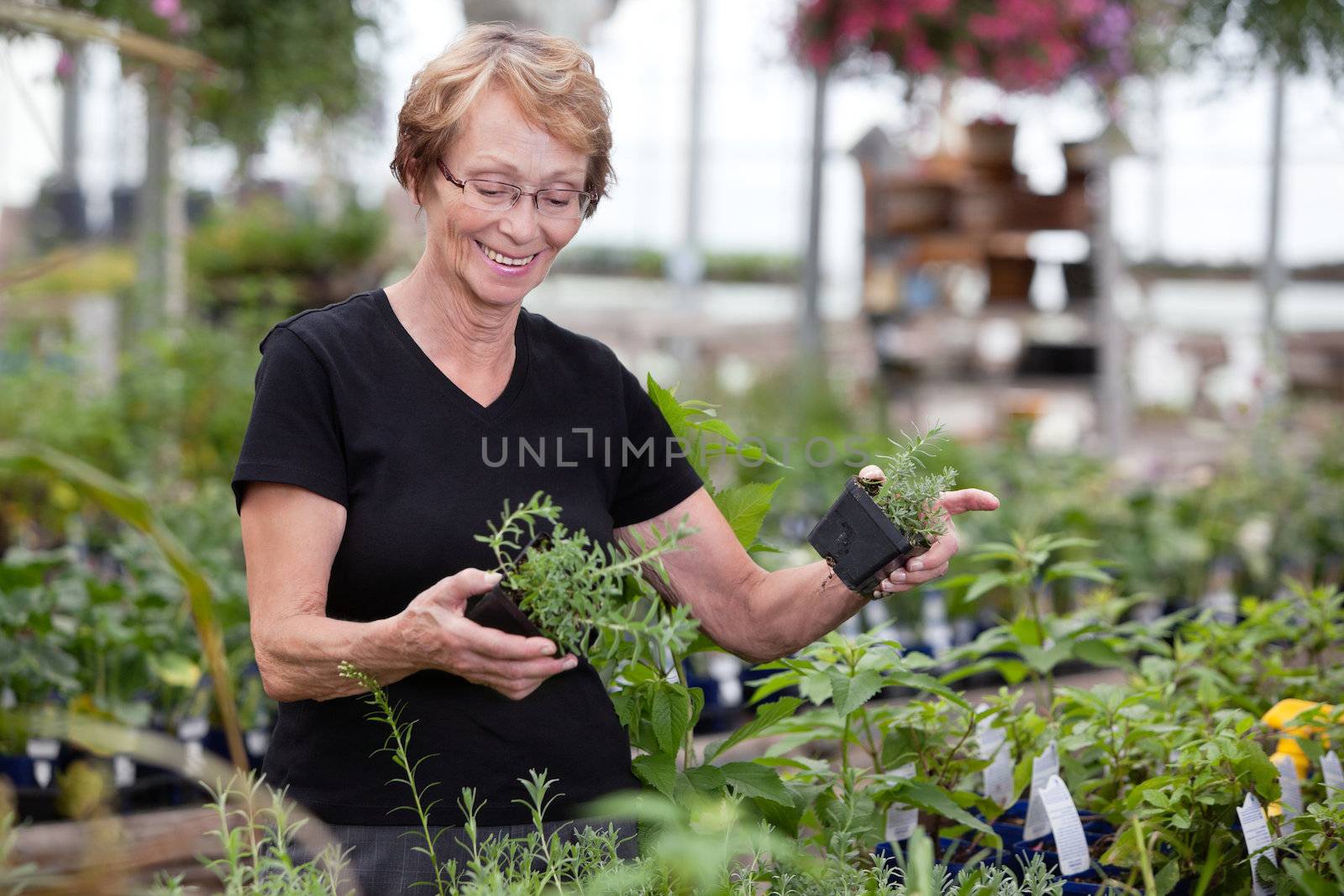 Woman at plant nursery by leaf