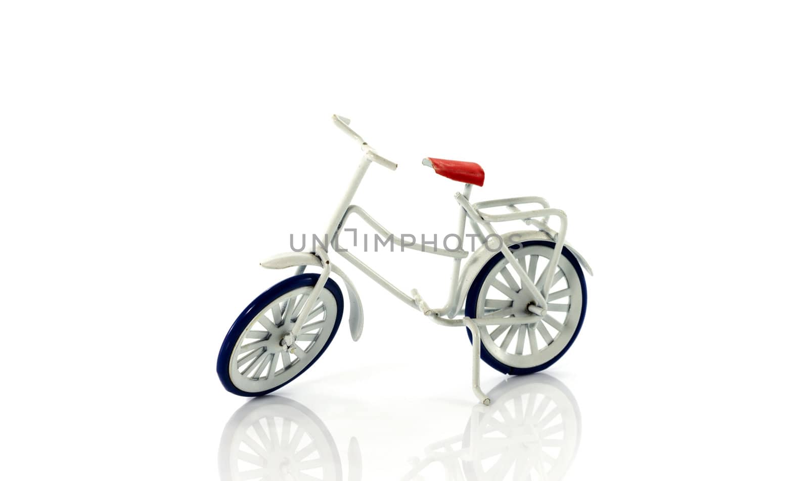 small white toy bike isolated on background