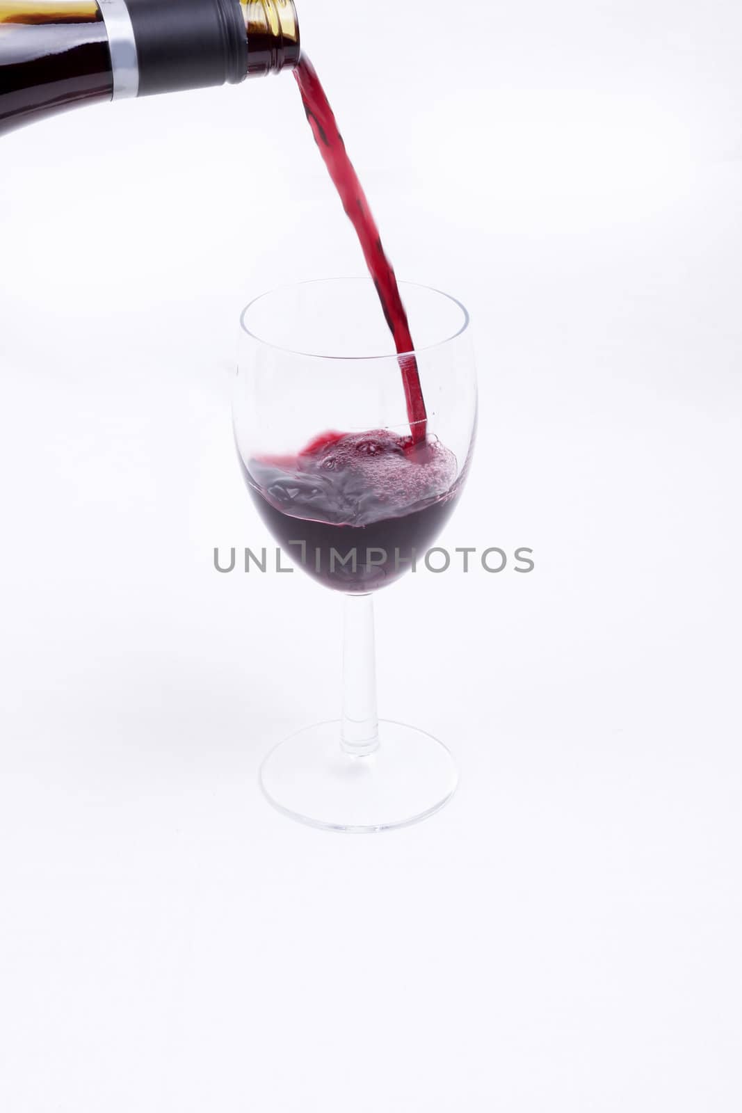  A glass of red wine isolated on white background,