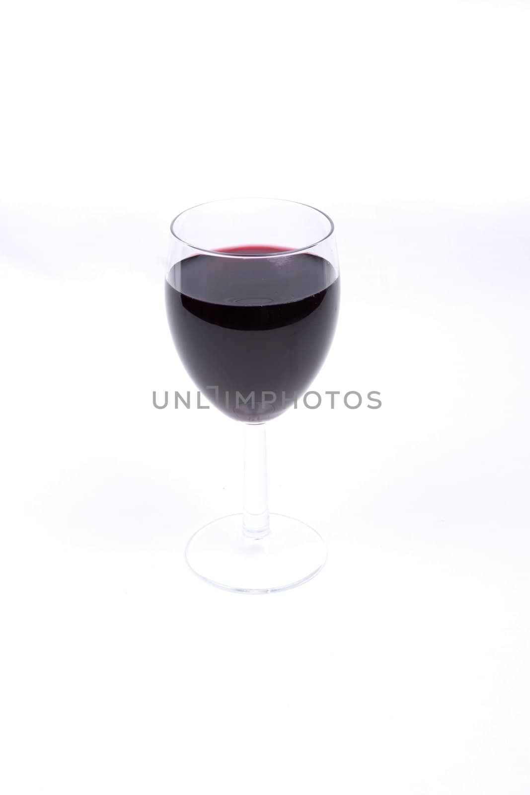 A glass of red wine isolated on white background,