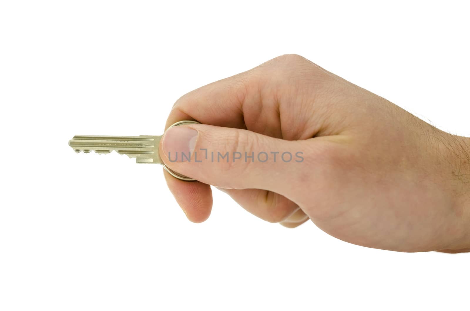 Male hand holding house key as if he is about to put it in a lock. Isolated over white background.