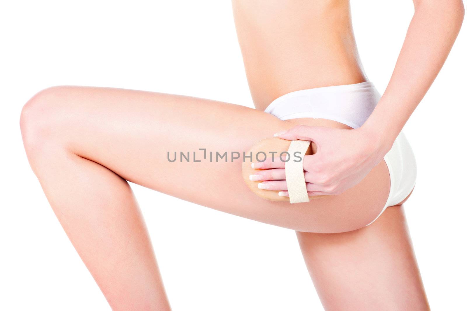 Legs care treatment with brush, isolated on white. Health concept