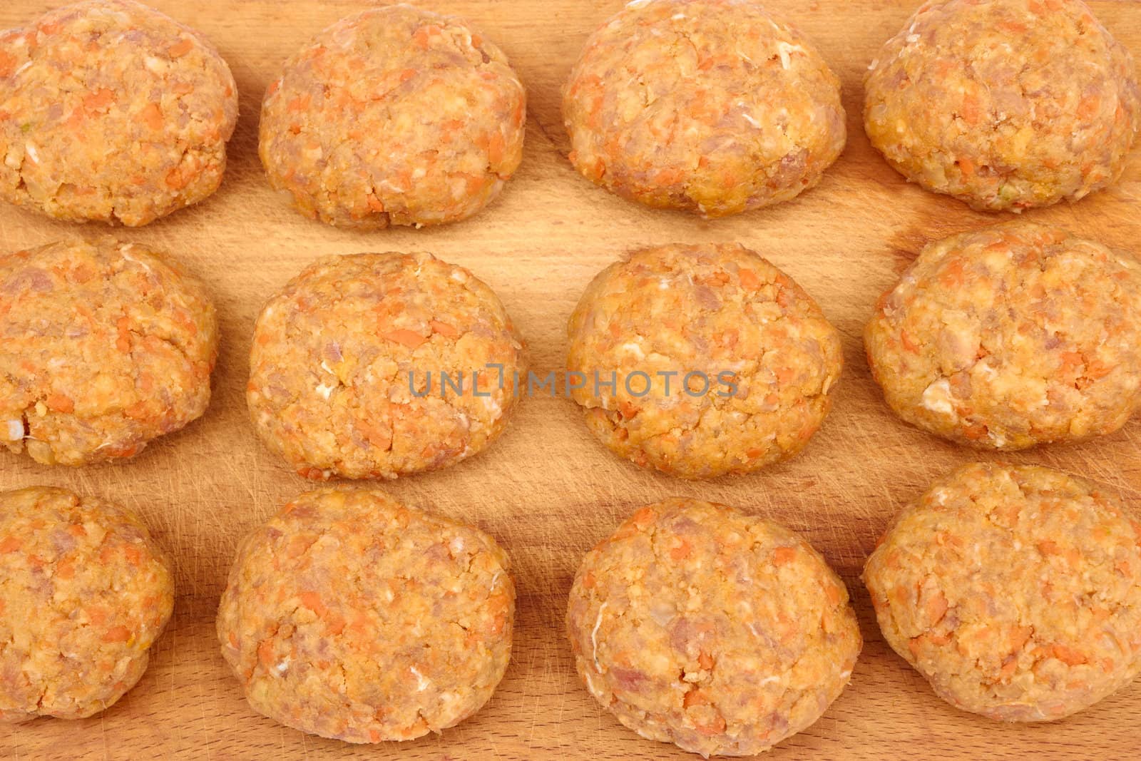 Group of uncooked cutlets on the kitchen chalkboard