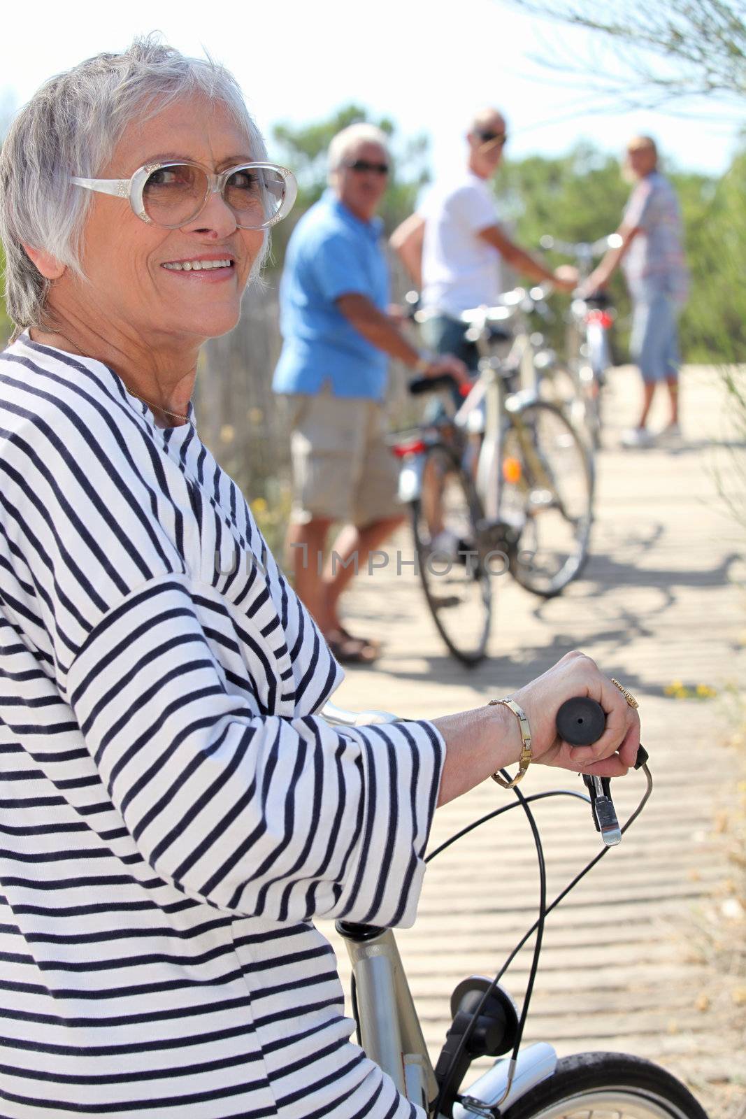 Senior people on bikes