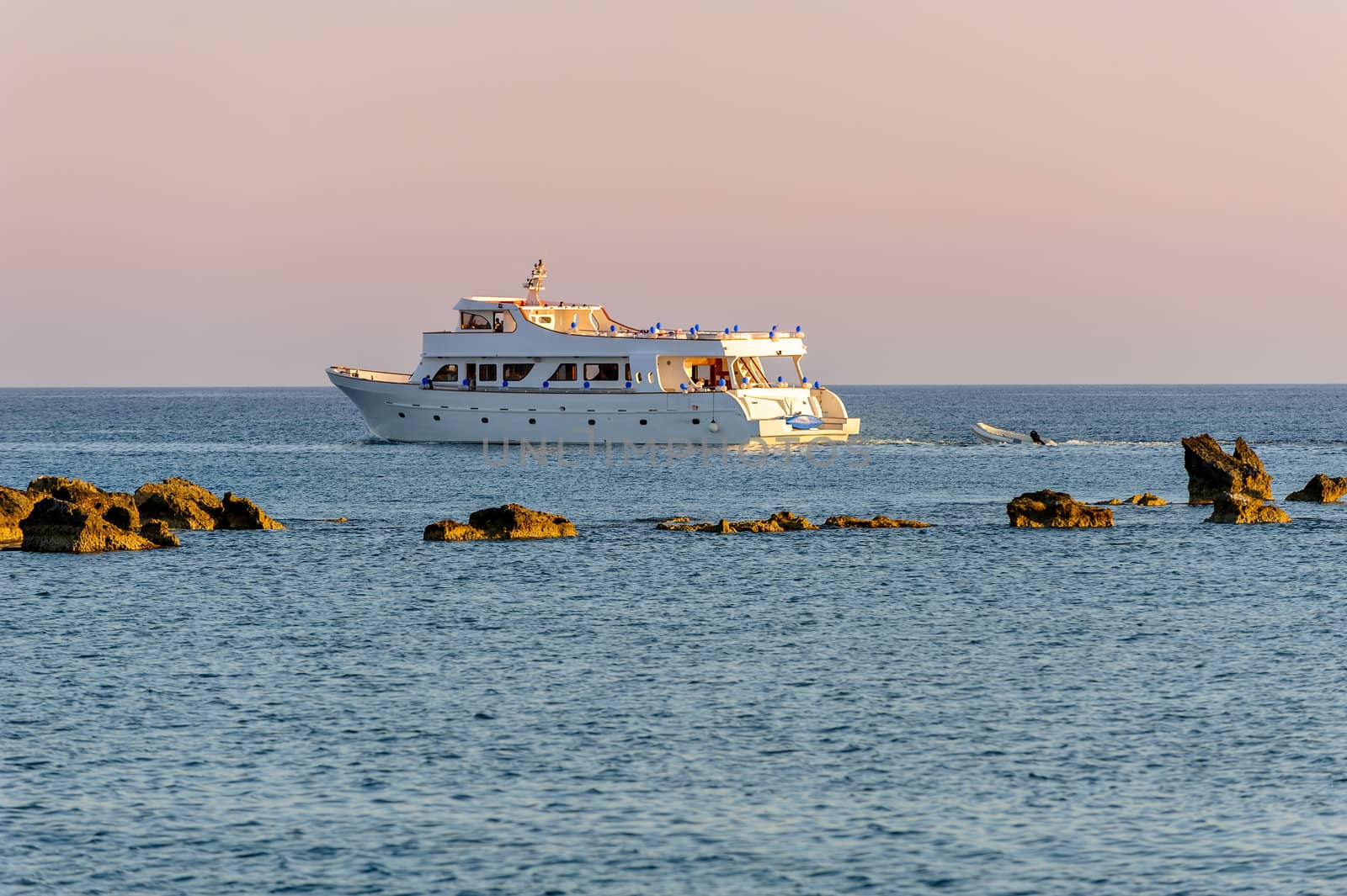 White cruise yacht in the sea by mahout