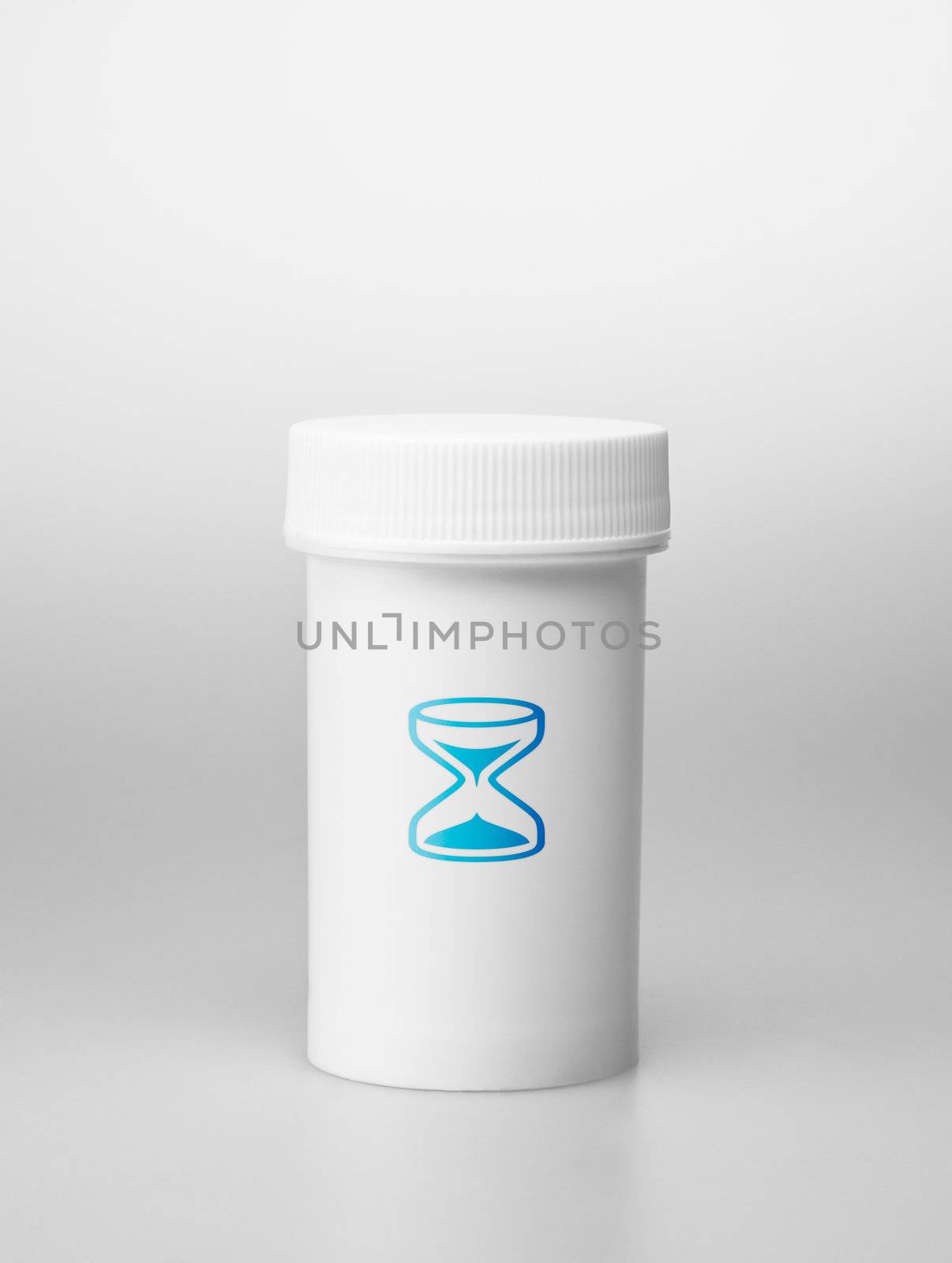 Small white medecine bottle