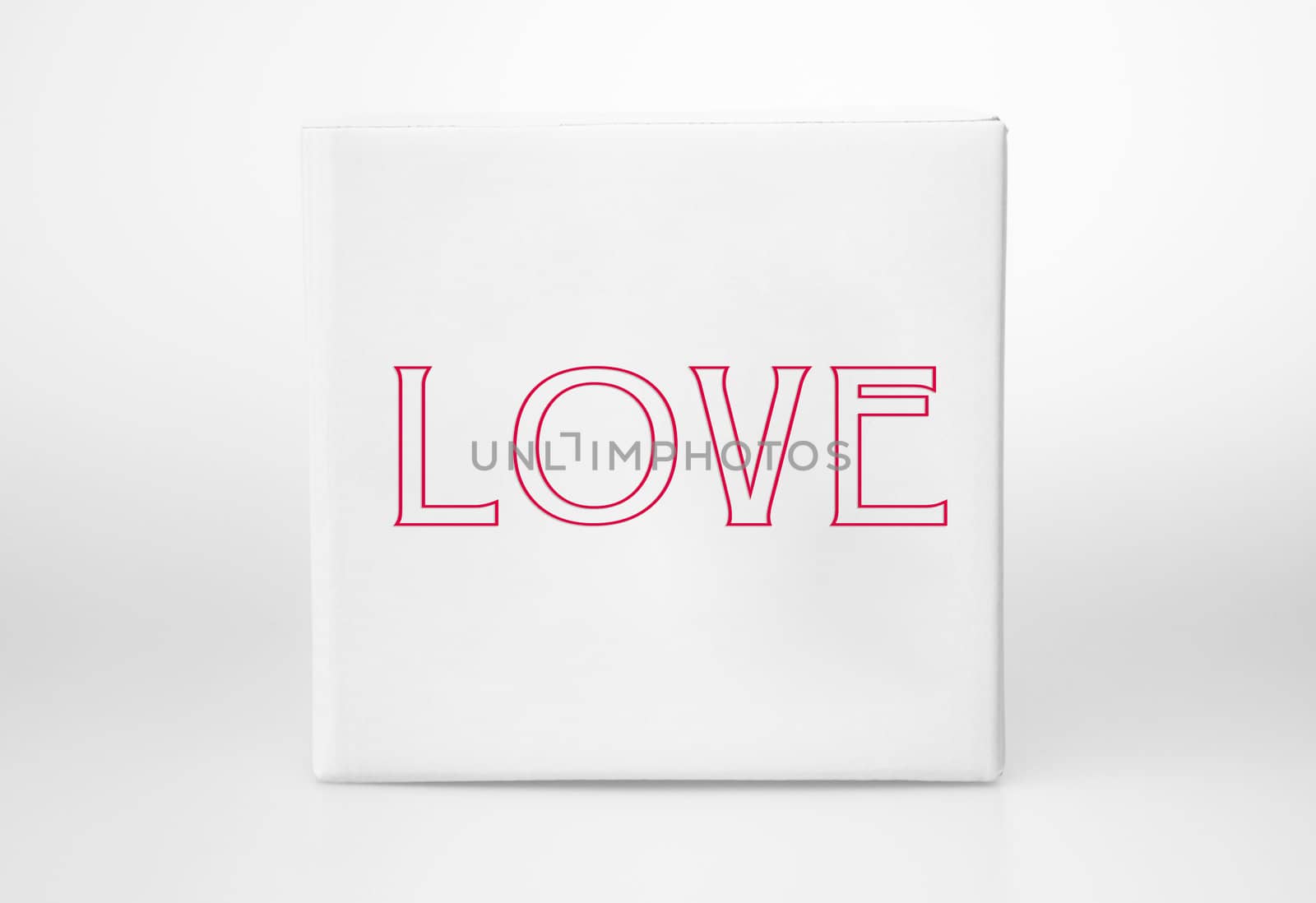 Small white boxe with the word Love