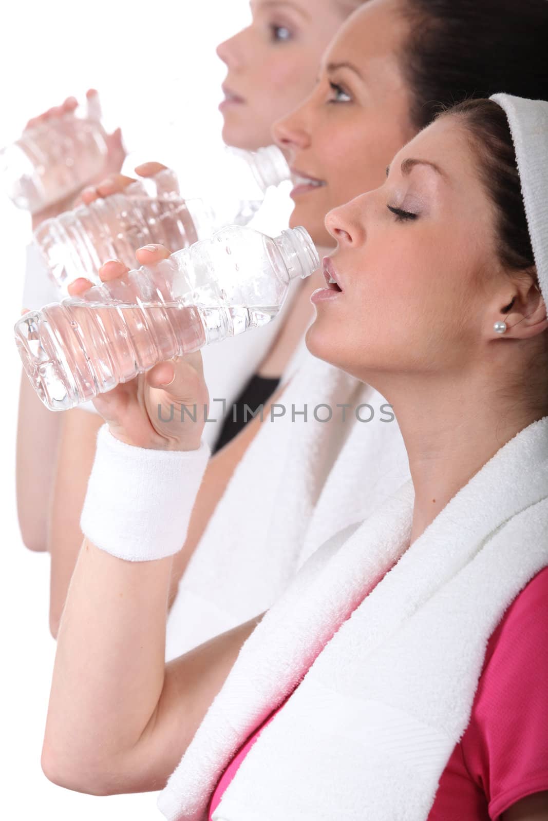 women drinking water after training by phovoir