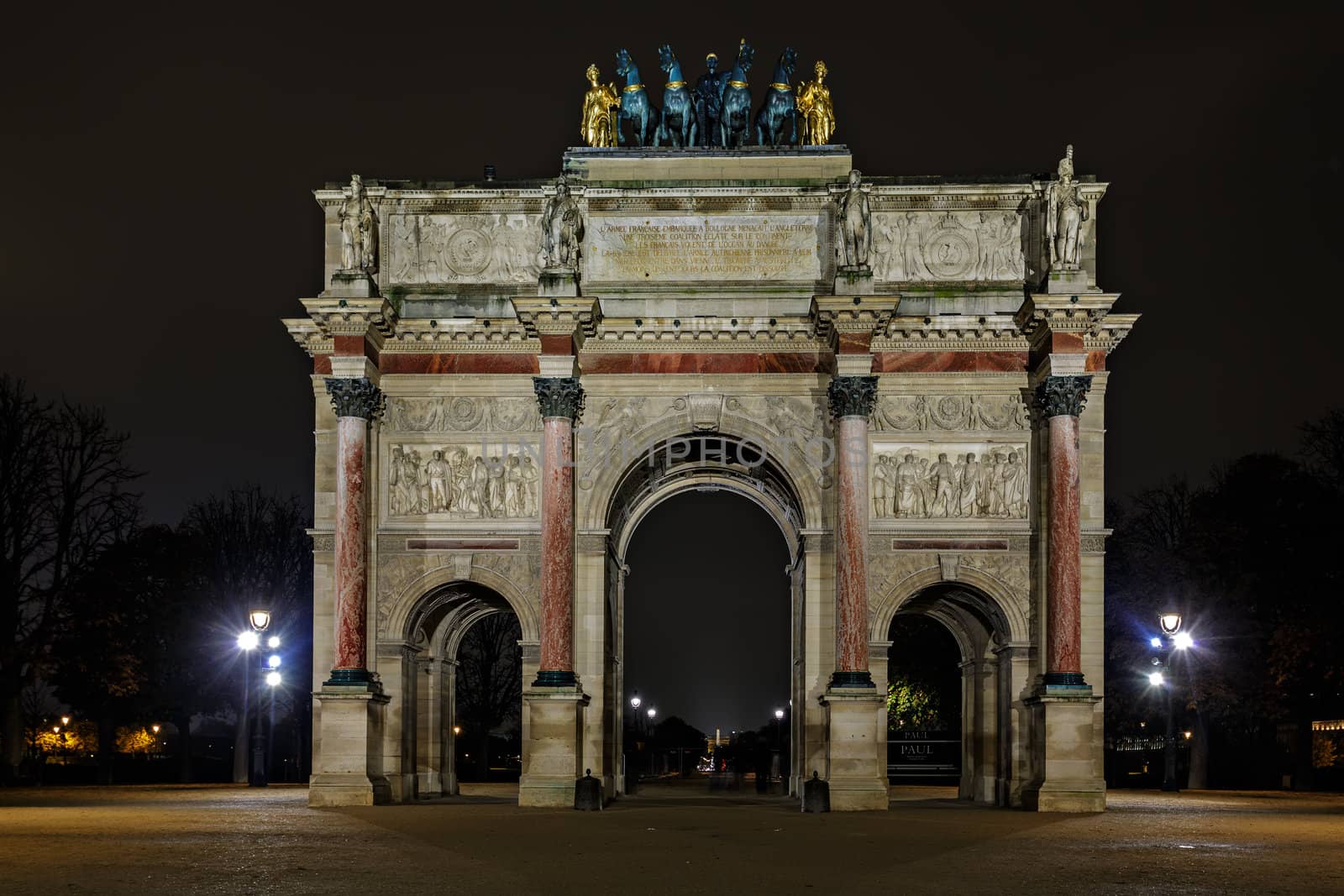 PARIS-NOV 10:Triumphal Arch (Arc de Triomphe du Carrousel) at Tuileries gardens in Paris,France on Nov 10,2012. The monument was built between 1806-1808 to commemorate Napoleon's military victories