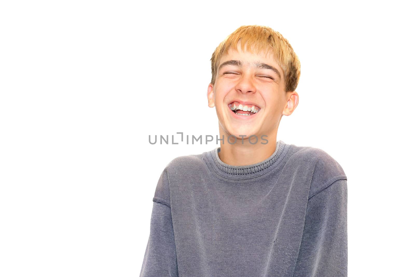 laughing teenage boy portrait isolated on the white background