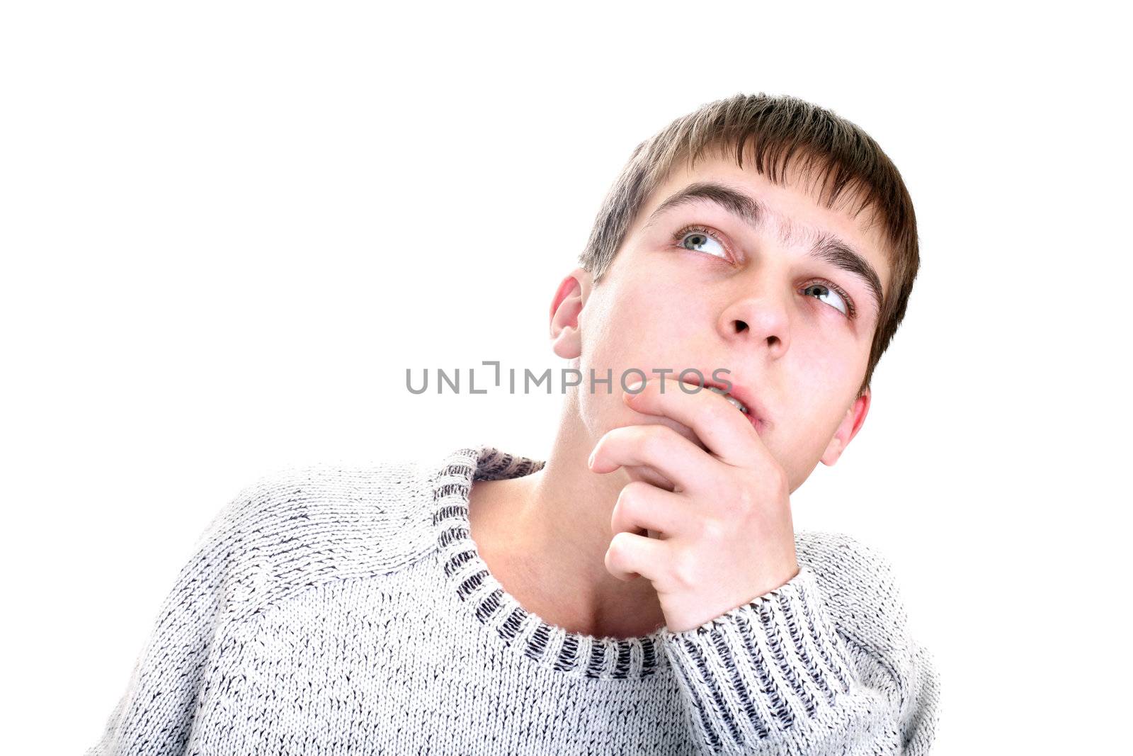 young man is thinking isolated on the white