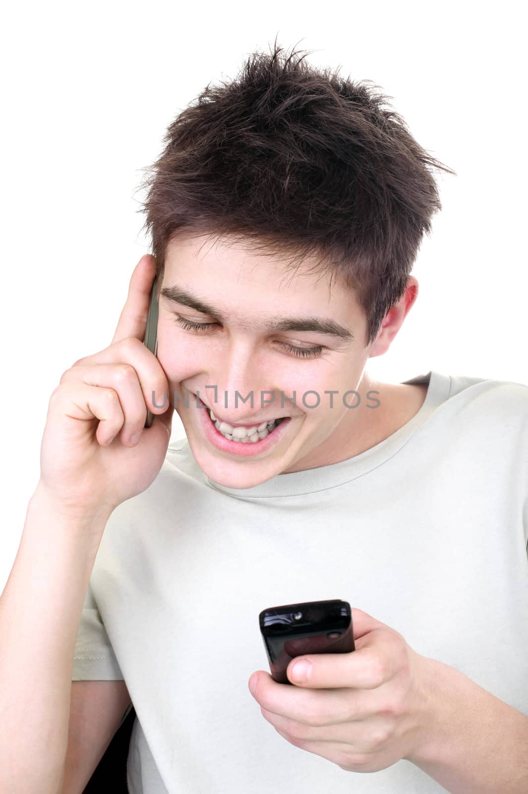 teenager with two phones by sabphoto