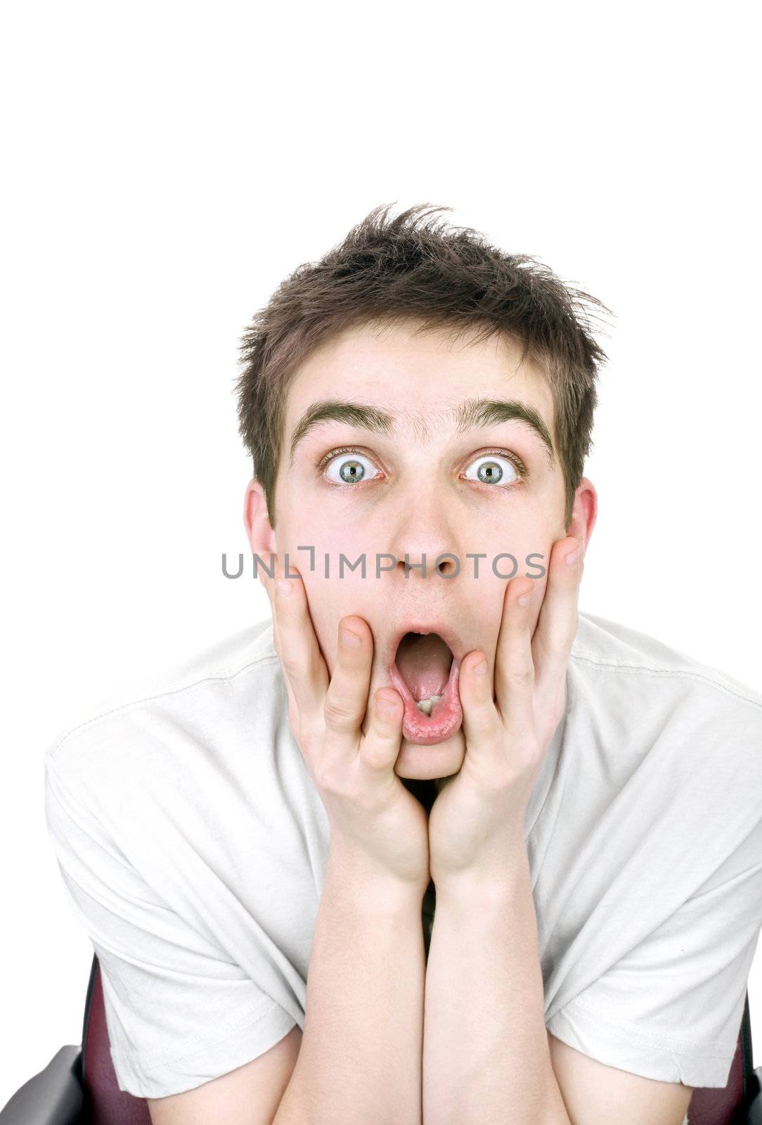 amazed young man isolated on the white background