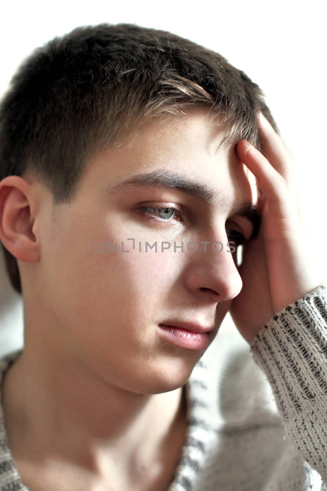 sad young man portrait closeup