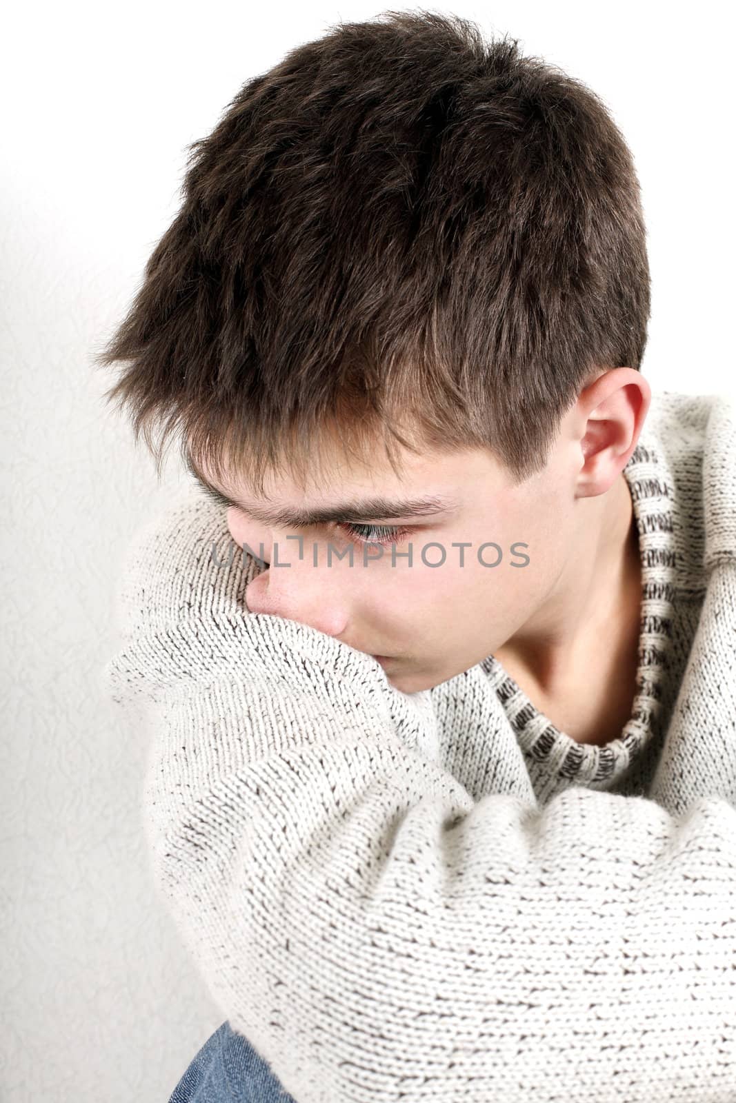 sad young man portrait closeup