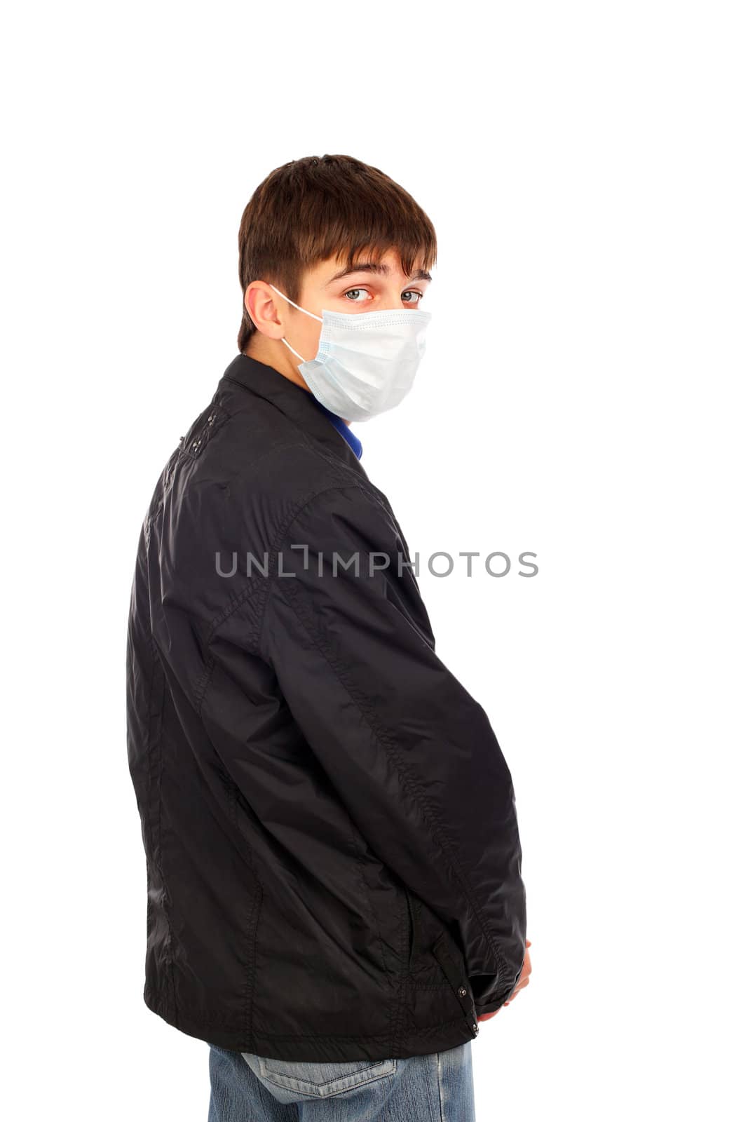 teenager in flu mask by sabphoto