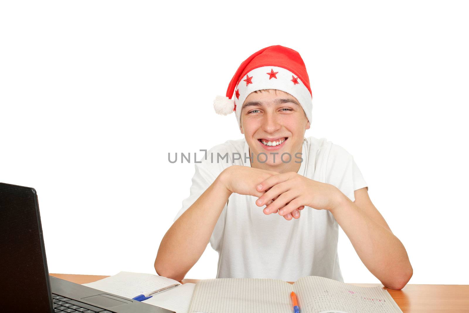 happy student in santa's hat. isolated on the white background