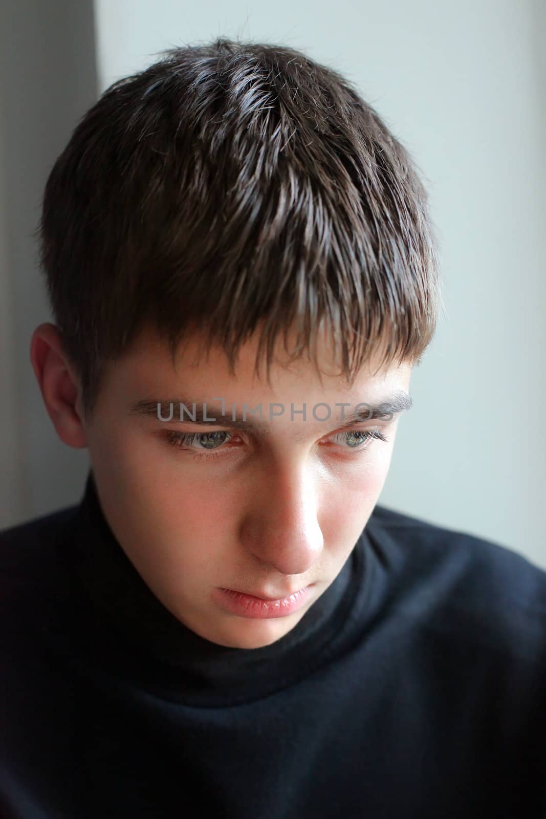 Portrait of the earnest Teenager Closeup