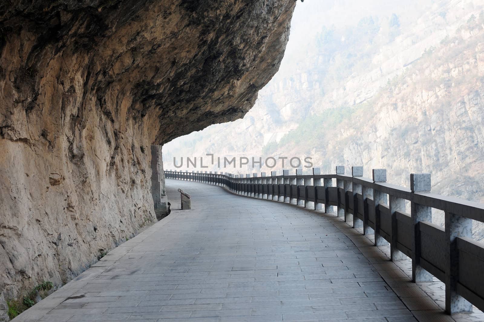 Highway built under a cliff 