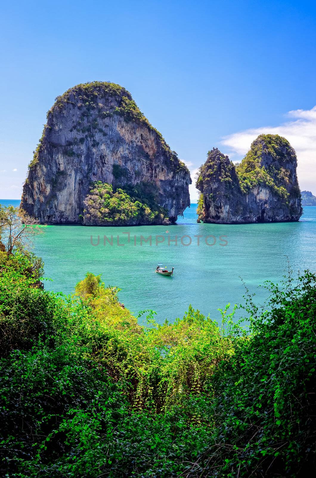 Tropical island and ocean view with boat, Andaman sea, Krabi, Thailand