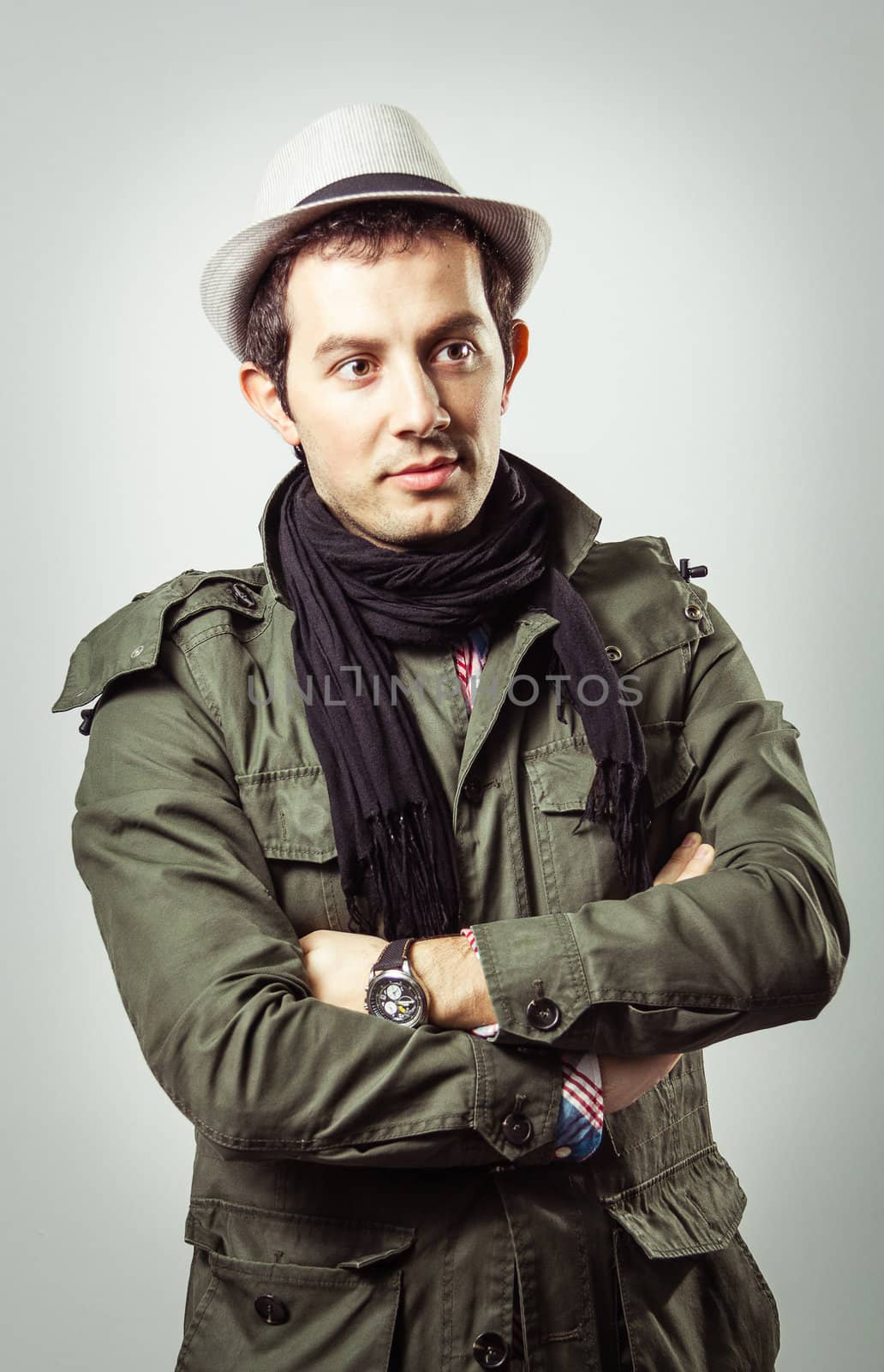 Portrait of young man wearing hat and scarf by doble.d
