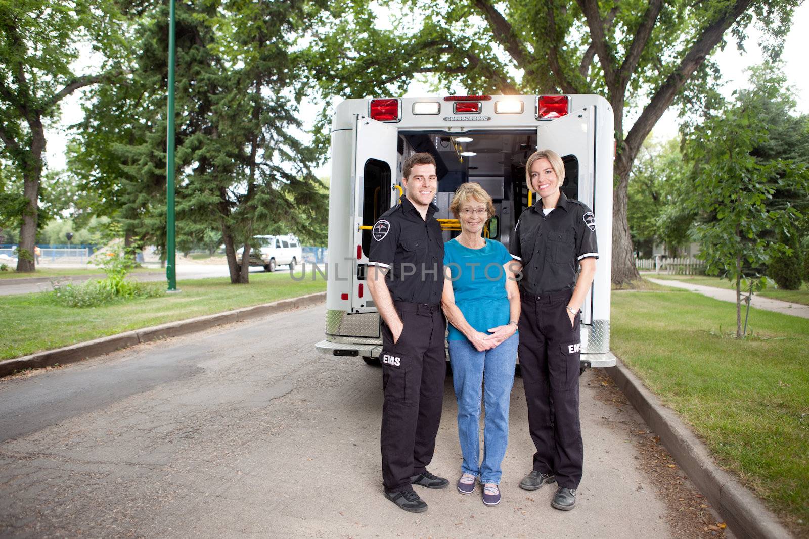 Ambulance Paramedic's with Patient by leaf