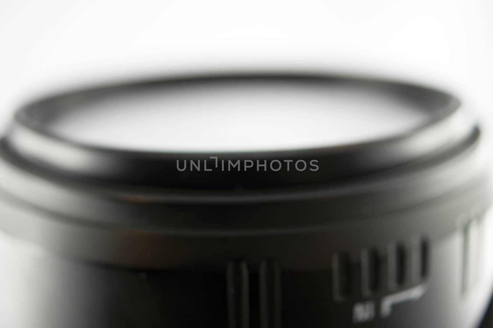 Lens with reflective gray and white background