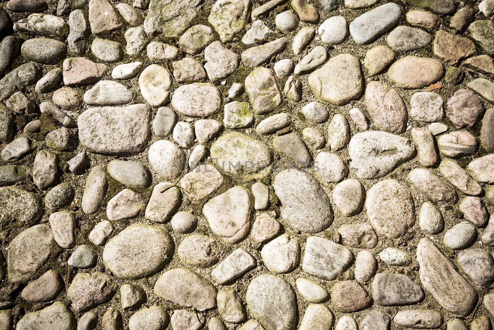 Detail of a medieval street from coarse pebbles