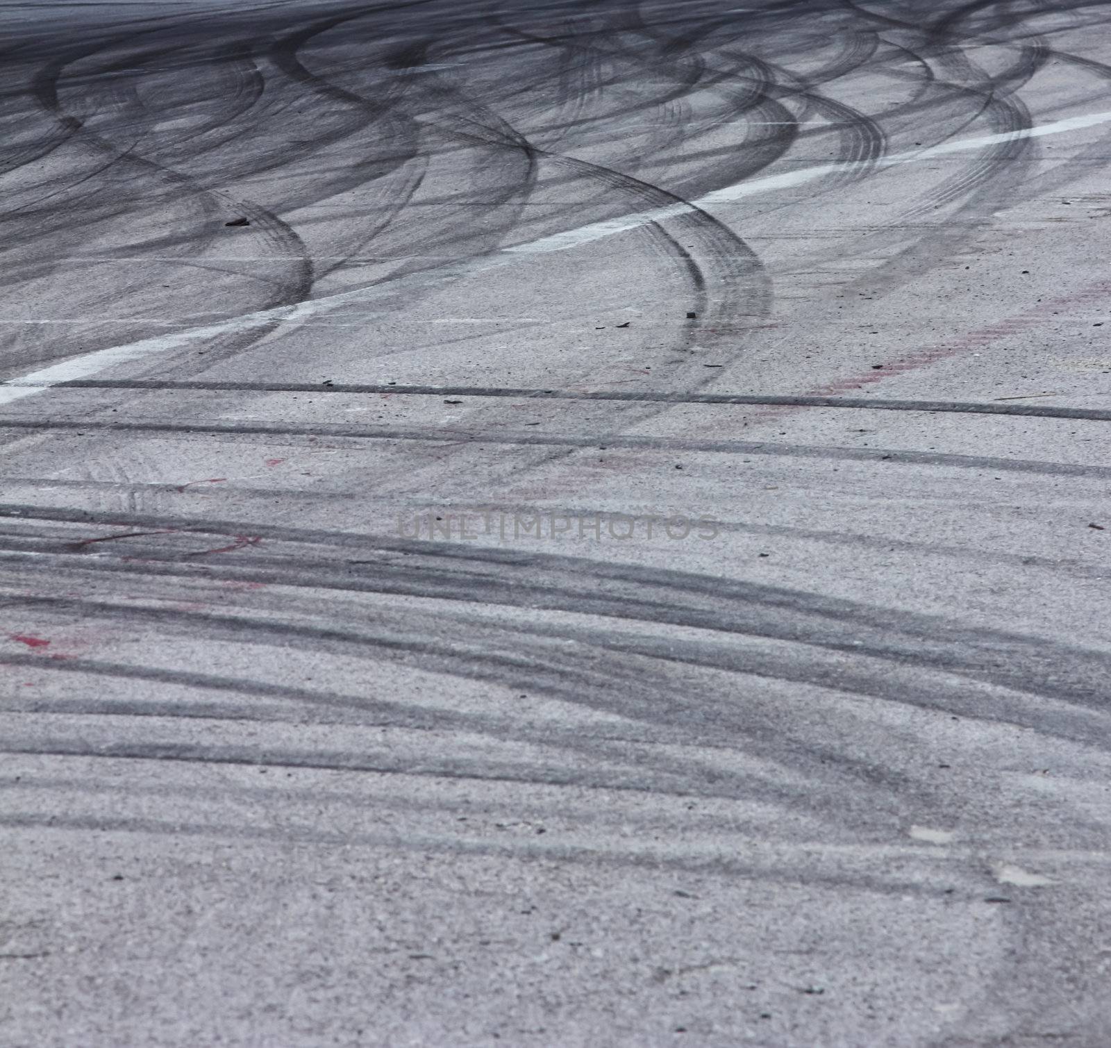 Background with tire marks on road track