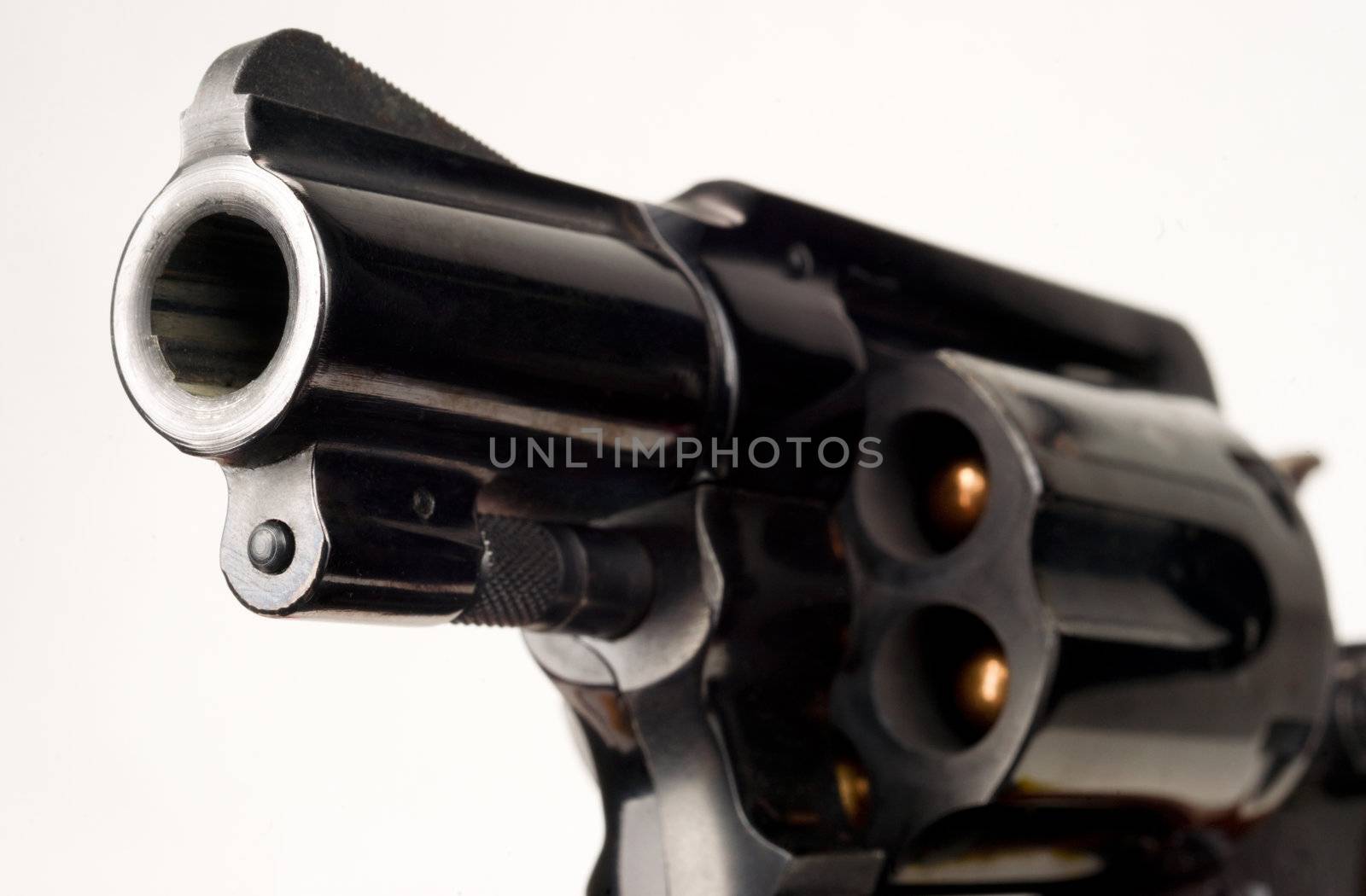 38 Caliber Revolver Pistol Loaded Cylinder Gun Barrel Close Up Pointed on White