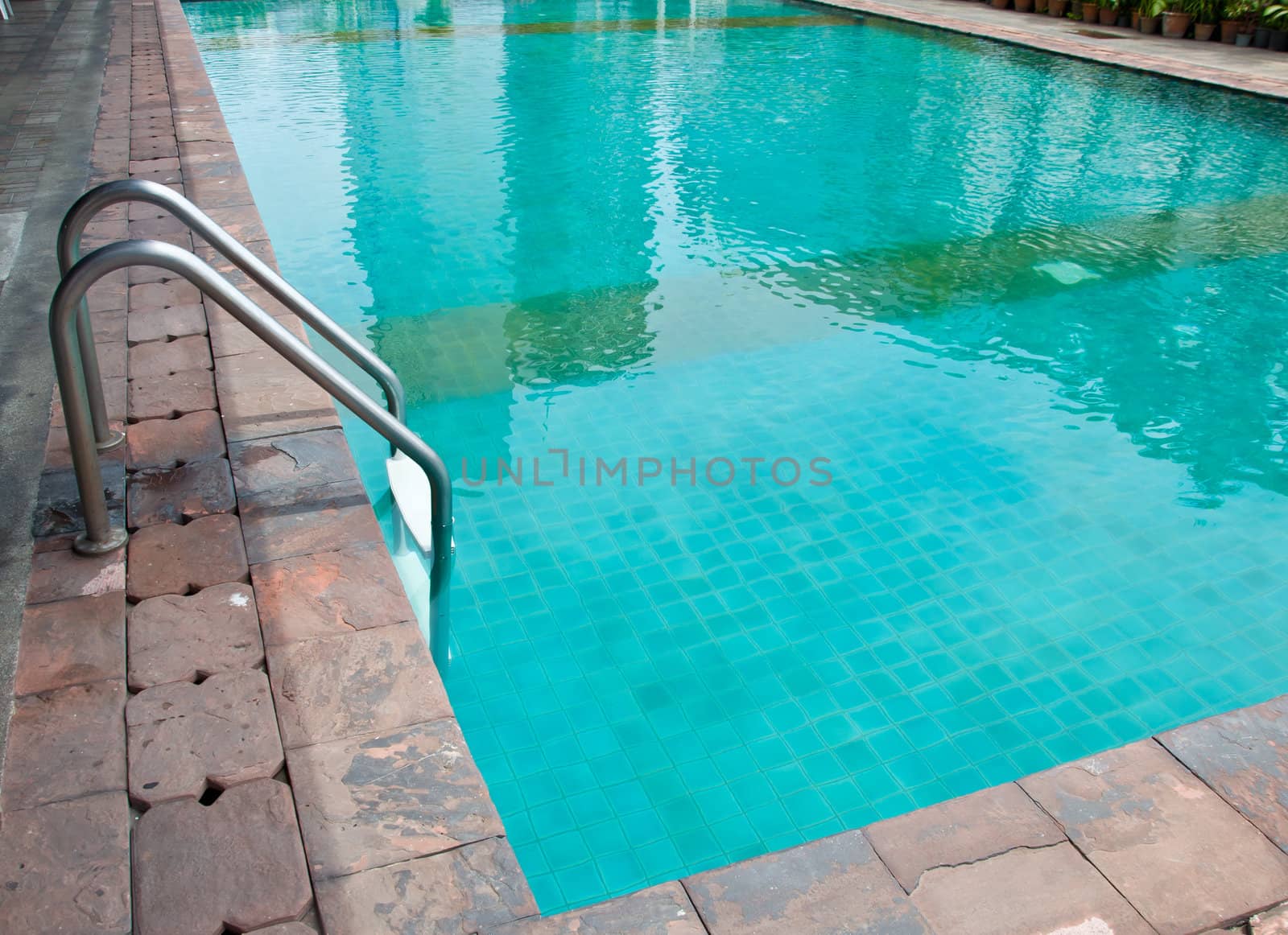 swimming pool in hotel for exercise and relaxation