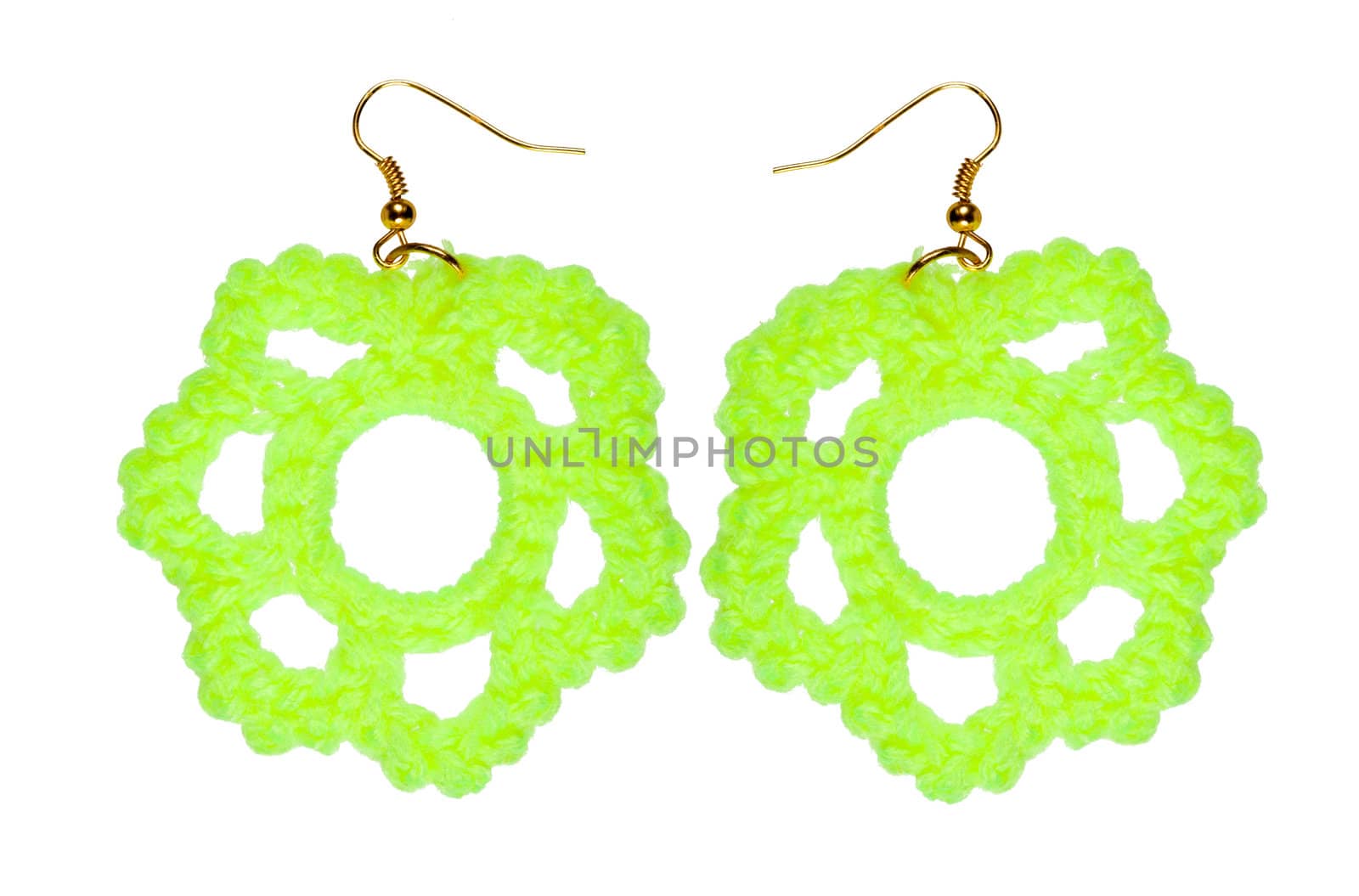 Knitted lace earrings on a white background. Handmade. Сollage