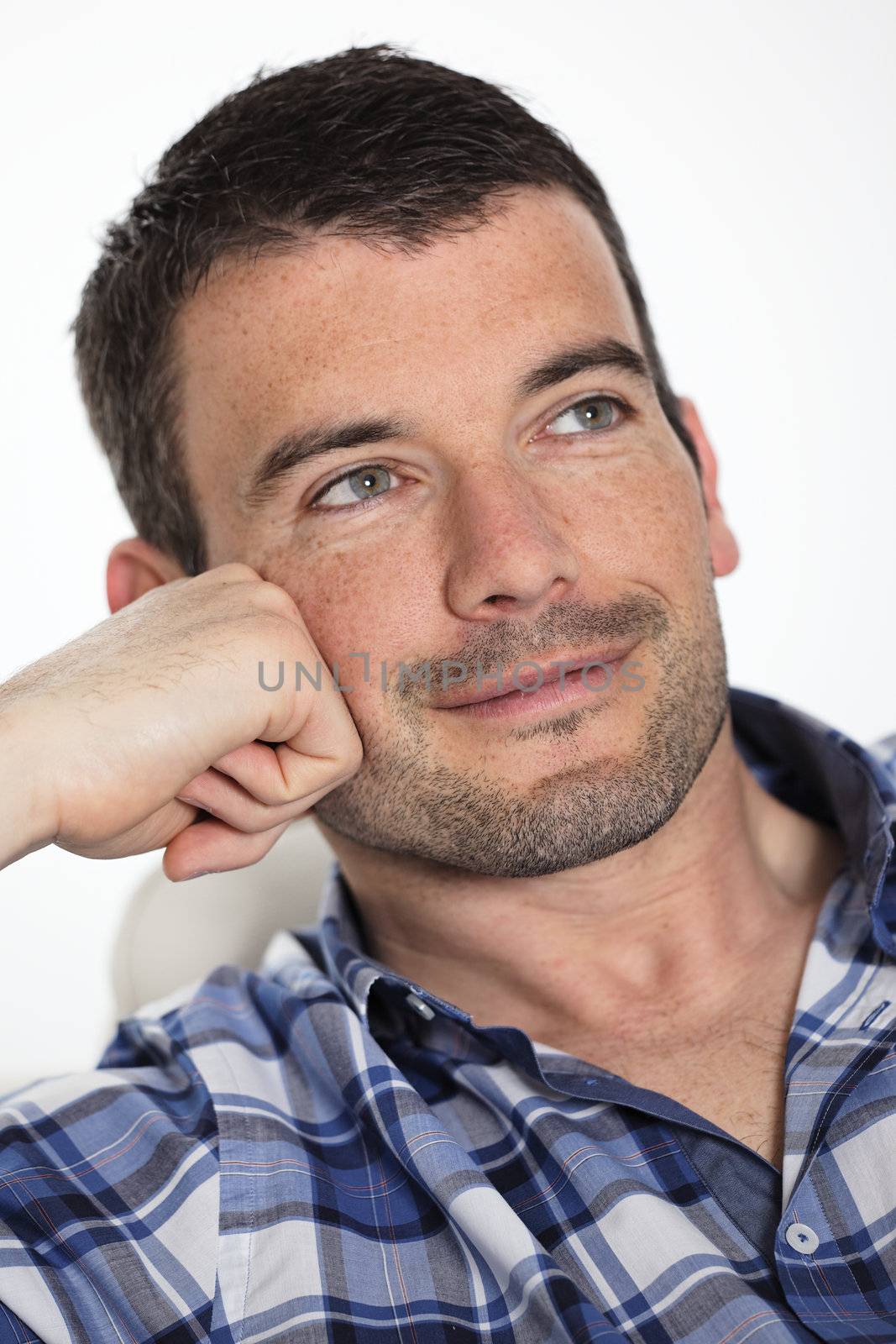 beautiful man relax on sofa at home