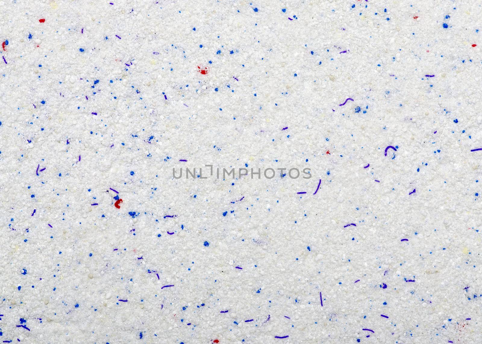 Washing powder texture with blue and red disseminations