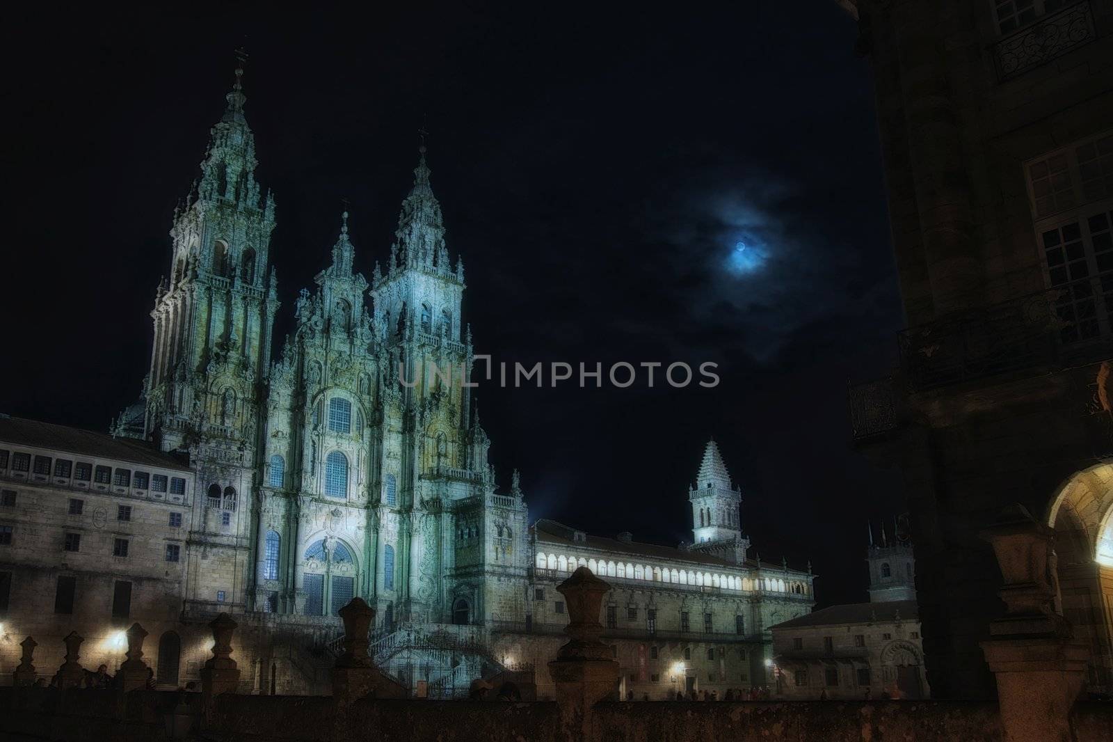 "Moon magic illuminates the facade of the cathedral of Compostela Santiago"