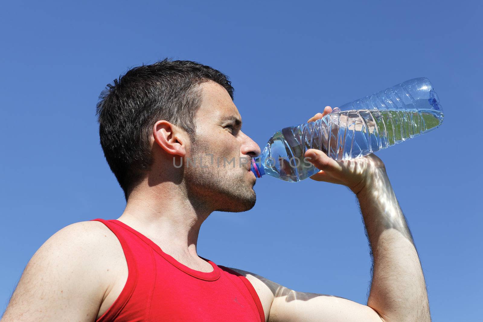 man drinking water